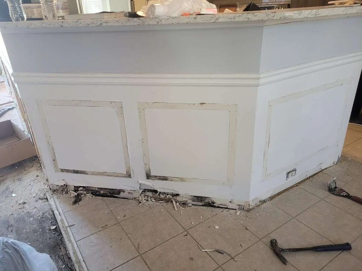 Water damage and mold on kitchen during Storm Damage Restoration in Tanaina